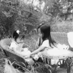 black and white family field portrait