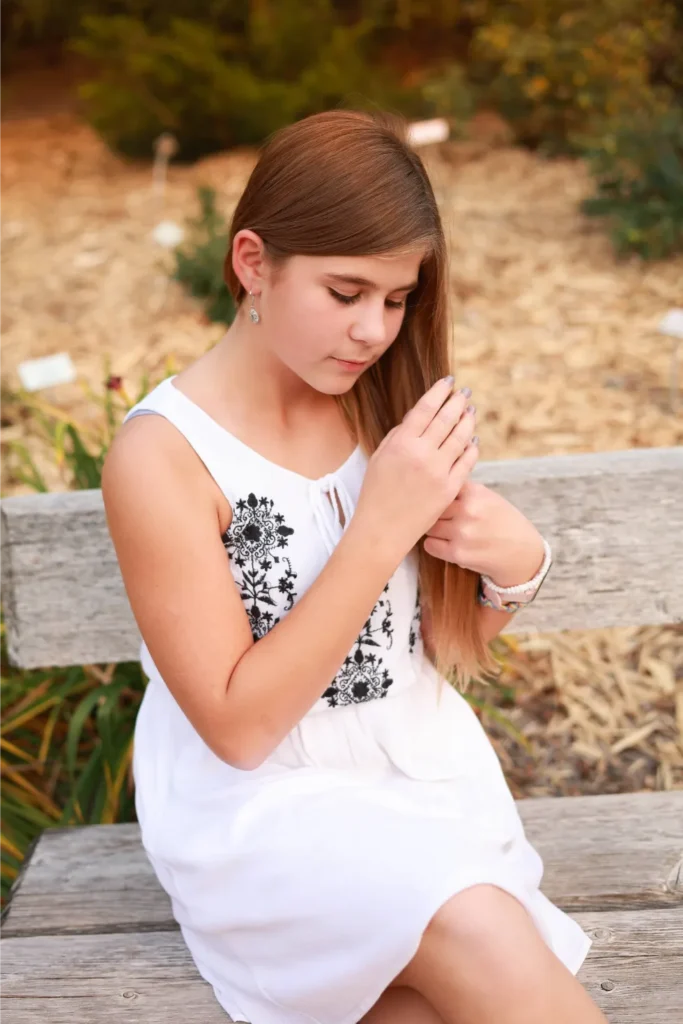 girl praying outdoor portrait