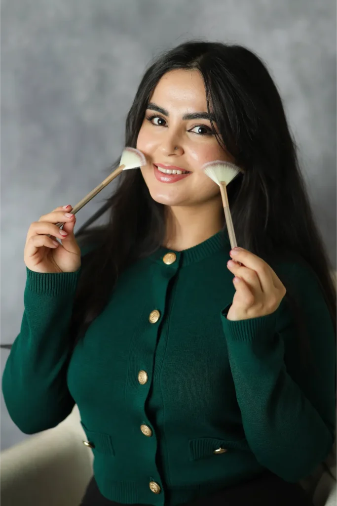 woman applying lip gloss beauty portrait