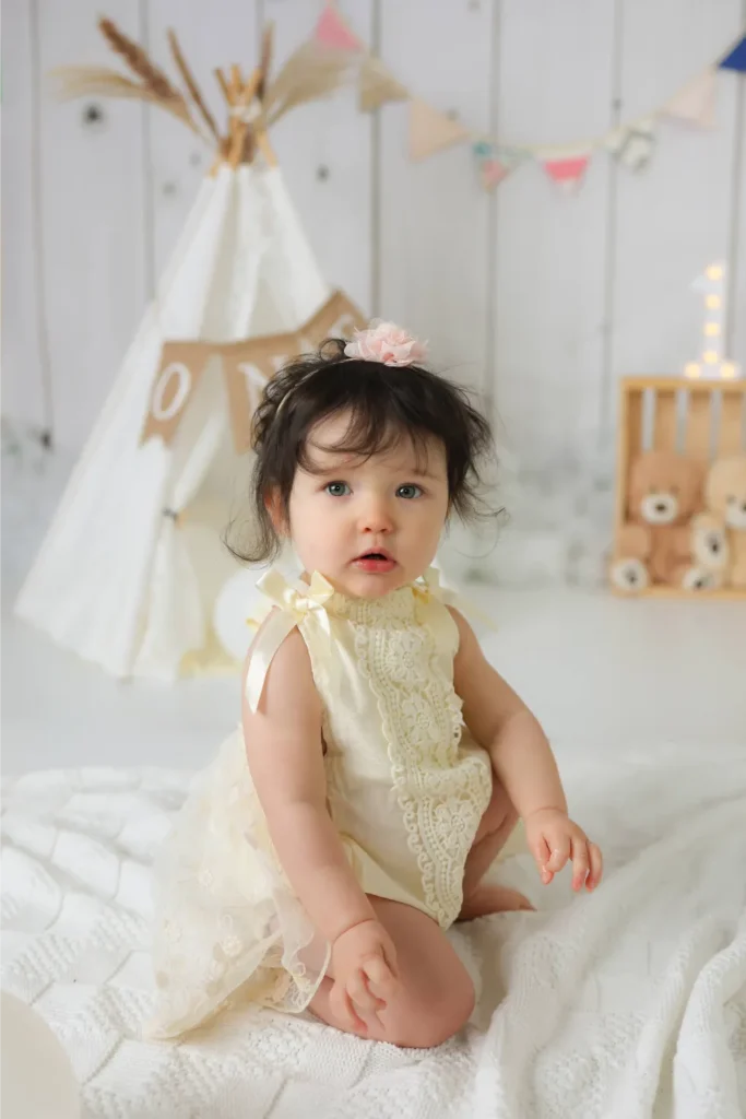 baby girl neutral outfit studio portrait