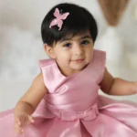 baby girl pink dress studio portrait