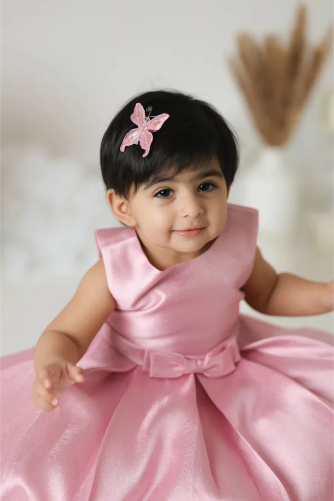 baby girl pink dress studio portrait