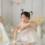 baby girl pink dress wooden walker