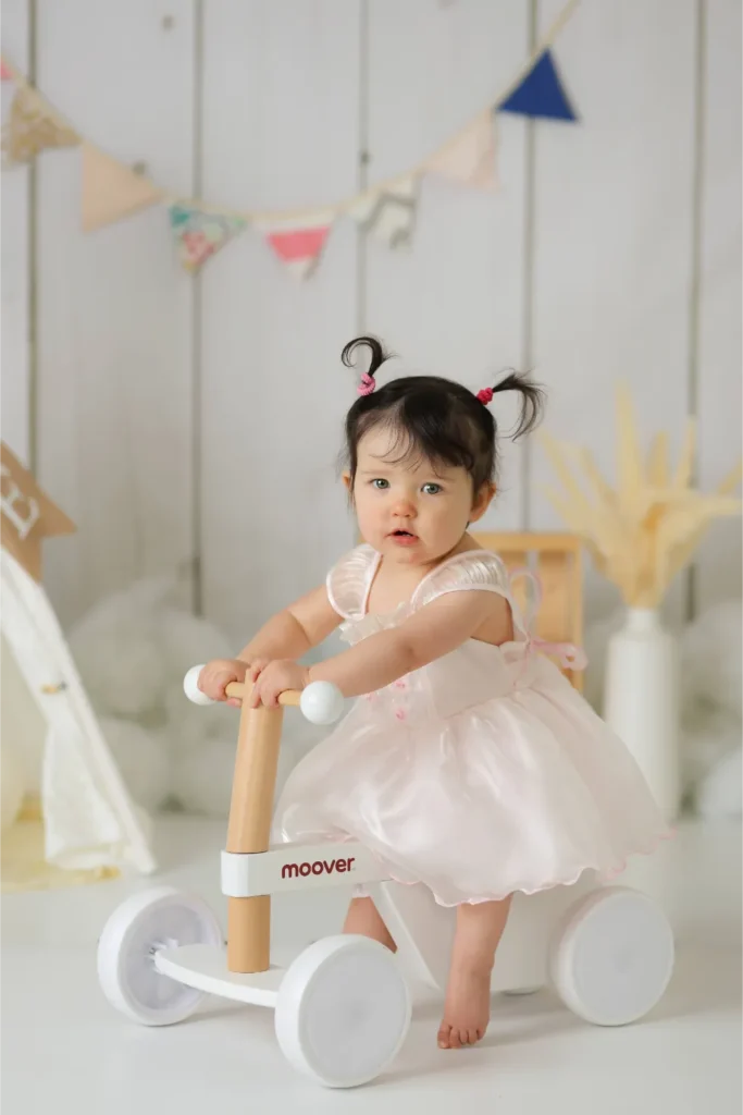 baby girl pink dress wooden walker