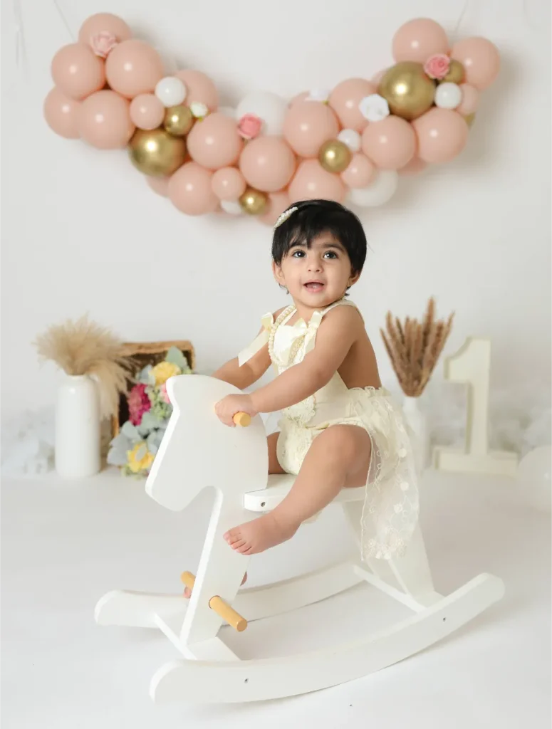 baby girl white dress rocking horse