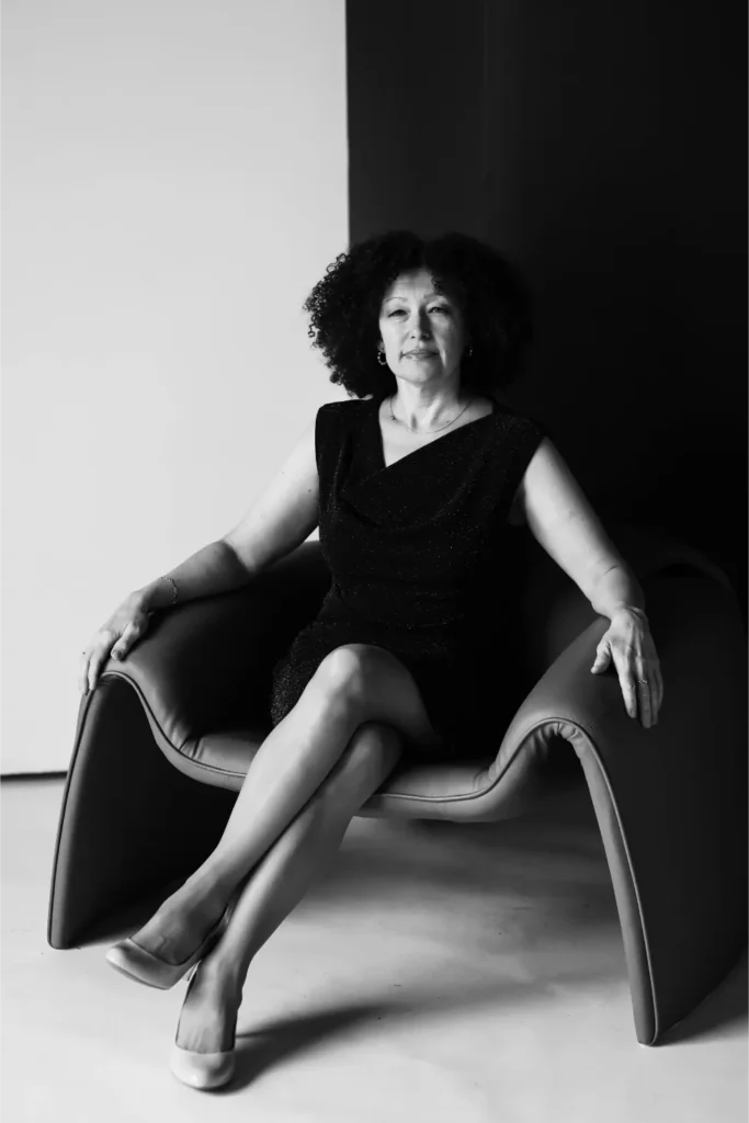 black and white woman chair portrait