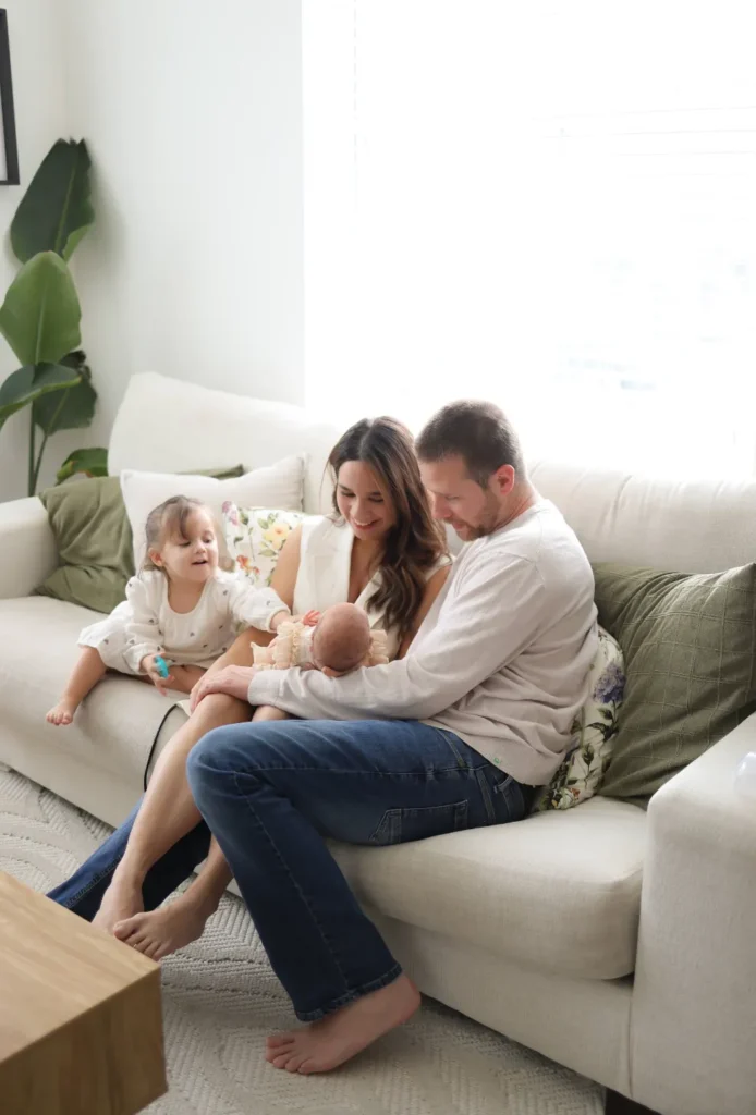 family sitting on couch lifestyle session