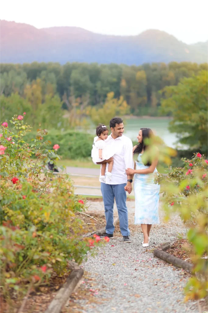 family walking through flower garden