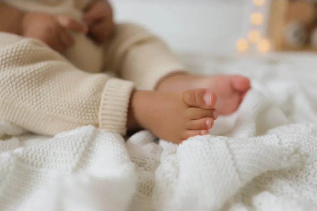 newborn baby feet close up