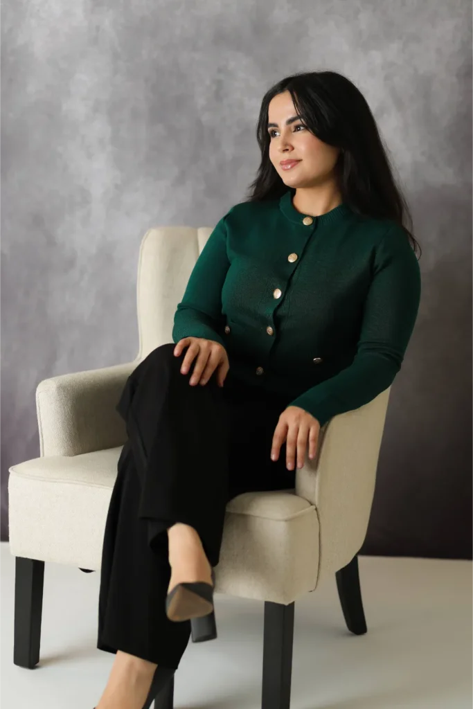 professional woman green dress studio portrait