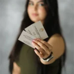 woman holding business cards branding portrait