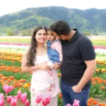 family walking through tulips lakeland bc