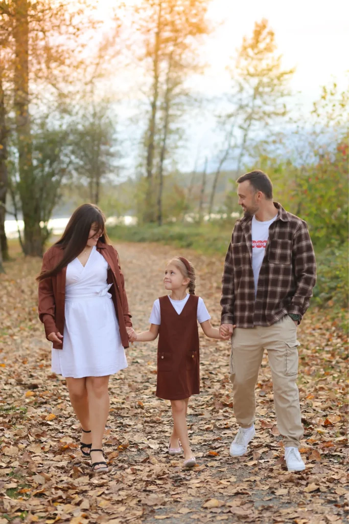 Family walking together during fall photoshoot in Chilliwack BC