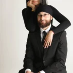 formal couple studio portrait black outfits
