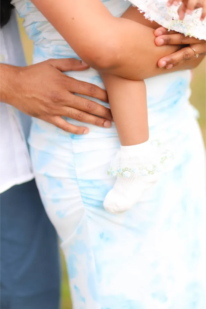 maternity detail parents hands on baby bump
