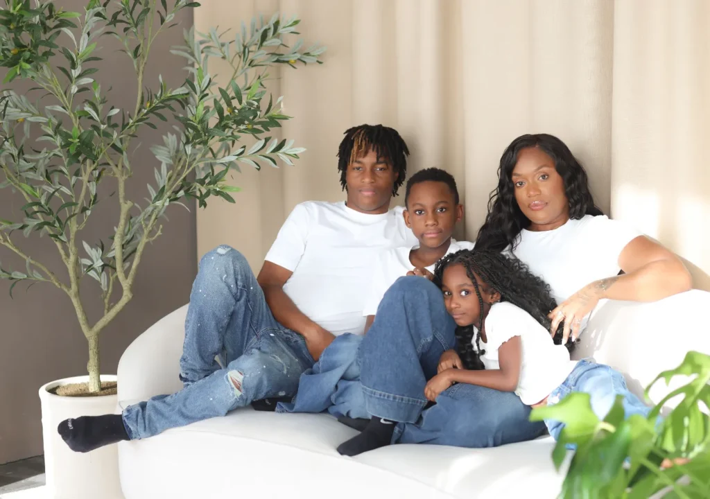 modern family portrait neutral studio setting