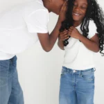 siblings playing during studio family session