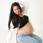 studio maternity portrait white shirt jeans