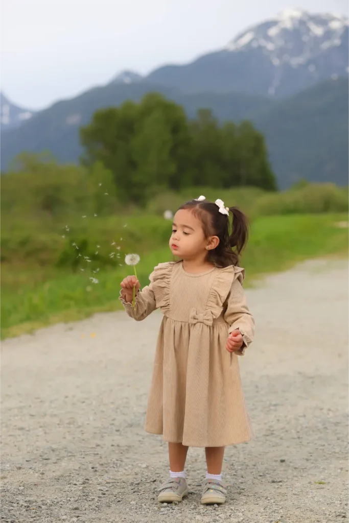 little girl beige dress mountain trail
