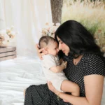 mother baby forehead touch