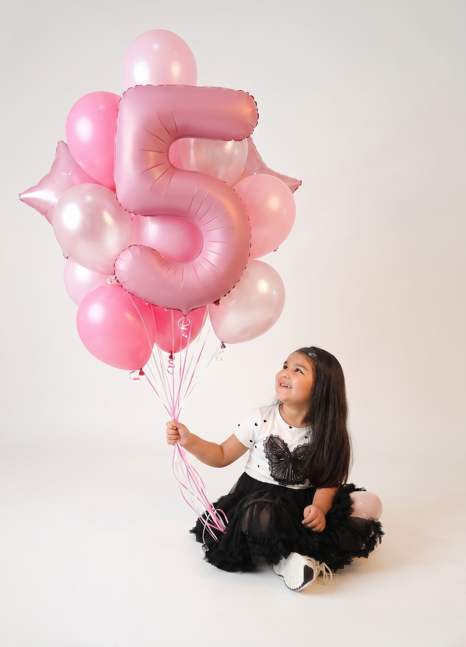 Girl Holding Five Balloon Birthday Portrait, photo 4