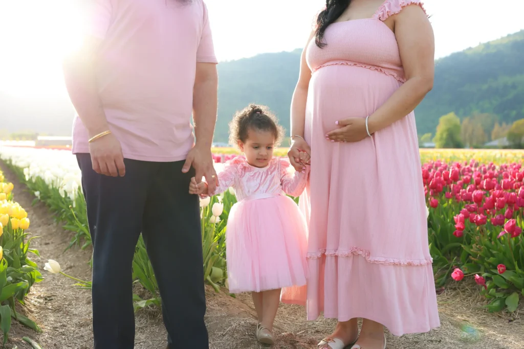 maternity family portrait pink outfits tulips