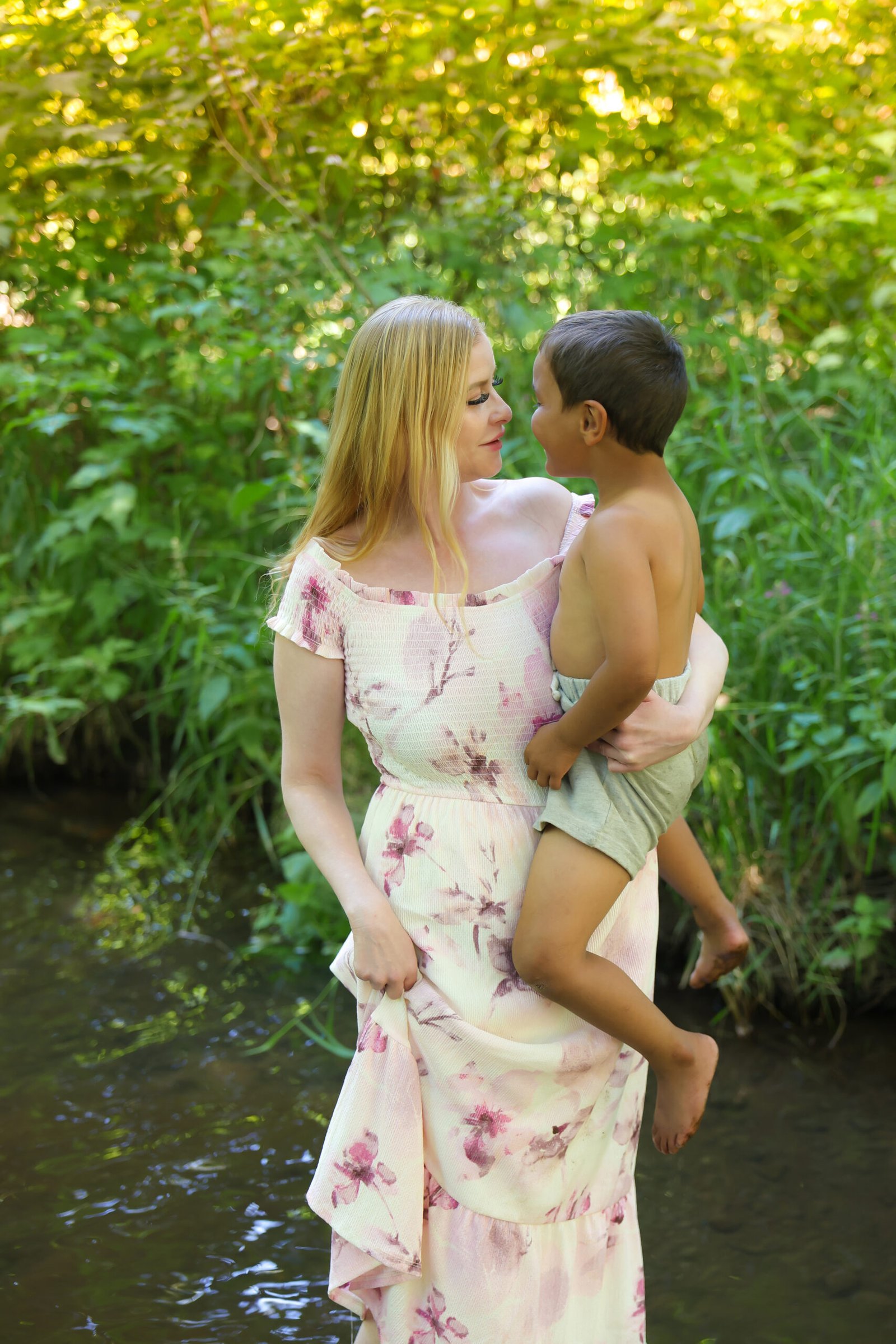Mother holding her child during an outdoor family photography session