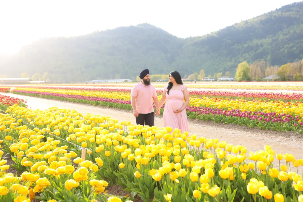 pregnant couple tulip field family session