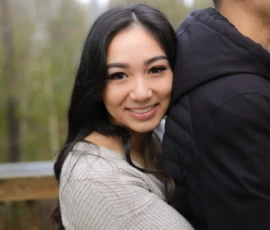 Couple embracing closely during outdoor portrait Couple embracing closely during outdoor portrait