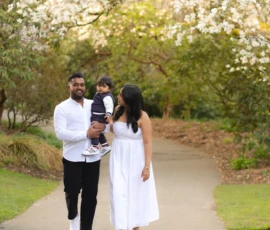 Couple walking together outdoors holding hands Couple walking together outdoors holding hands