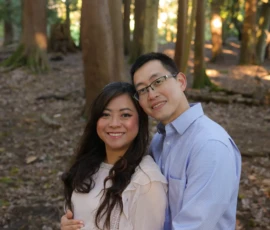 Expecting couple standing together in forest portrait Expecting couple standing together in forest portrait