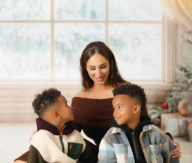 Family Cuddling During Christmas Photoshoot Family Cuddling During Christmas Photoshoot