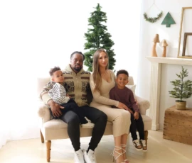 Family on studio sofa with small Christmas tree backdrop scaled 1 Family on studio sofa with small Christmas tree backdrop scaled 1