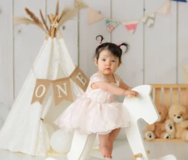 baby girl studio smile tent scaled 1