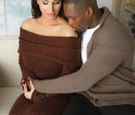 couple hugging in front of window photoshoot couple hugging in front of window photoshoot