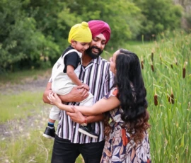 happy family portrait outdoor mom dad son hugging happy family portrait outdoor mom dad son hugging