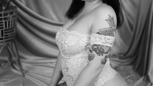 boudoir gold drape seated front bw